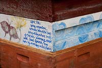 Detail of hand painted beehive