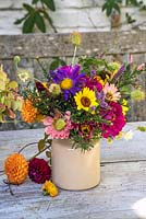 Autumnal flower arrangement including Zinnias