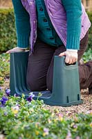 Garden kneeler with sides for help getting up.