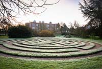 Turf maze created in the 1980s at Doddington Hall, Lincolnshire on a frosty March morning