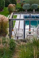 Overview of Pergola and swimming pool at large Surrey Garden 