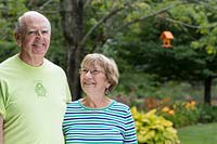 Homeowners Mike and Anita Sheehan in their country garden