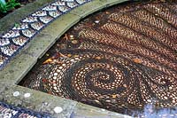 Pebble mosaic pond at Thenford Arboretum, October