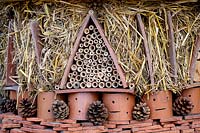 Recycled roof tiles re-used to form bug hotel