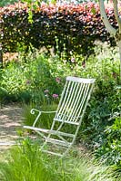Antique wrought iron folding garden seat