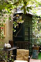 Large outdoor chest of drawers in Italian terrace garden. 
