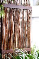 Hand-woven willow privacy screen
