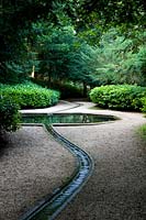Water rill leading to feature pool