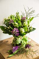 Floral bouquet with parrot tulips, Chrysanthemums, Hyacinths and Hypericum. 