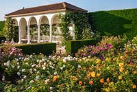 View over colourful rose beds and loggia in The Renaissance Garden 