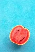 Watermelon set against blue background 