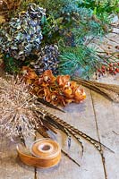 Materials required to make rustic winter wreath