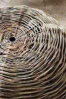 Top of a round table or chair showing flat top of circular woven Salix - Willow
