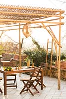 Hand built bamboo gazebo on terrace 