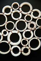 Bamboo table mat, cut circles of bamboo canes tied together 