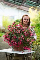 Marta Stegani with Begonia in container.