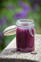 Homemade blueberry curd in a kiln jar
