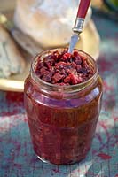 Allotment apple and vegetable pickle in a jar. Ingredients include swede, courgettes, beetroot, cauliflower, carrots and apples
