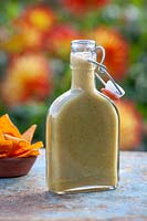 Garcia's green Chilli sauce in a bottle with tortilla chips