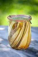 Pickled courgettes in kiln jar