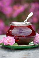 Jar of petalberry strawberry jam made with rosewater and scented rose petals