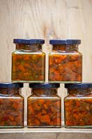 Jars of spicy curried carrot chutney