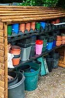 Tidy storage of pots and trays - Open Gardens Day, Earl Stonham, Suffolk