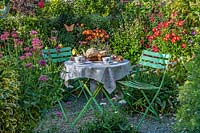 Garden table with tea for two at Driftwood in Sussex