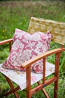 Floral cushions on director chairs