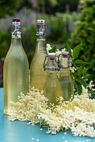 Bottles of homemade elderflower cordial
