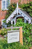 Carriers Cottage sign in front garden
