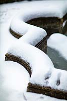 Detail of snowy fountain