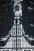 Decorative iron gates leading to the Avenue of Cypresses at Giardino Giusti, Verona. 