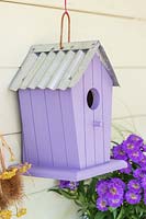 Purple decorative birdhouse