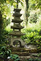 A stone lantern in a Japanese-style garden 