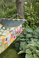 Hammock with colourful blanket