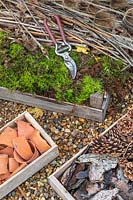 Tools and materials for creating a globe insect hotel on a post