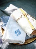Fabric napkin with embroidered Bluebell flower in blue