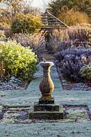 The Sundial Garden at Wollerton Old Hall Garden, Shropshire -  Planting includes: Salvia microphylla 