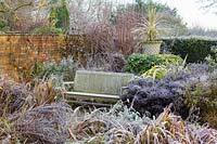 The Lanhydrock Garden at Wollerton Old Hall Garden, Shropshire - Rosa 'Parkdirektor Riggers', Cordyline Australis Variegata, Phormium and Hedera 