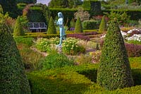 The Lamp of Wisdom statue by Natham David in the formal garden at Waterperry Oxfordshire, August