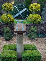 Armillary sun dial with clipped Buxus - Box - hedging and topiary