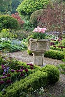 Stone urn in Cotswold Manor House Garden
