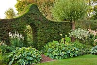 Topiary yew arch.
