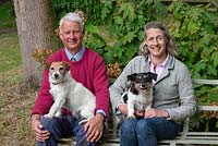 Rupert and Sarah Eley, in East Bergholt Gardens with their two Yorkshire terriers, Puffball and Flopsy.