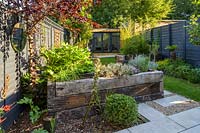 Walthamstow Modern Garden  with Raised Bed and Garden Room by Earth Designs 