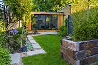 Walthamstow Modern Garden with Raised Bed and Garden Room by Earth Designs 