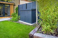 Garden Room and Tool Box in Walthamstow Modern Garden with Raised Bed and Garden Room by Earth Designs -
