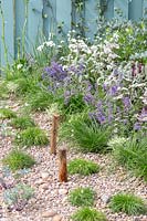 Seaside gravel garden with painted timber fence. By The Sea, RHS Hampton Court Palace Flower Show, 2017. Design: James Callicott, Sponsors: Southend. 