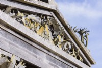 Detail of the temple made from green oak and topped with antlers from the estate, designed by Julian and Isabel Bannerman in the Collector Earl's Garden at Arundel Castle, West Sussex in May